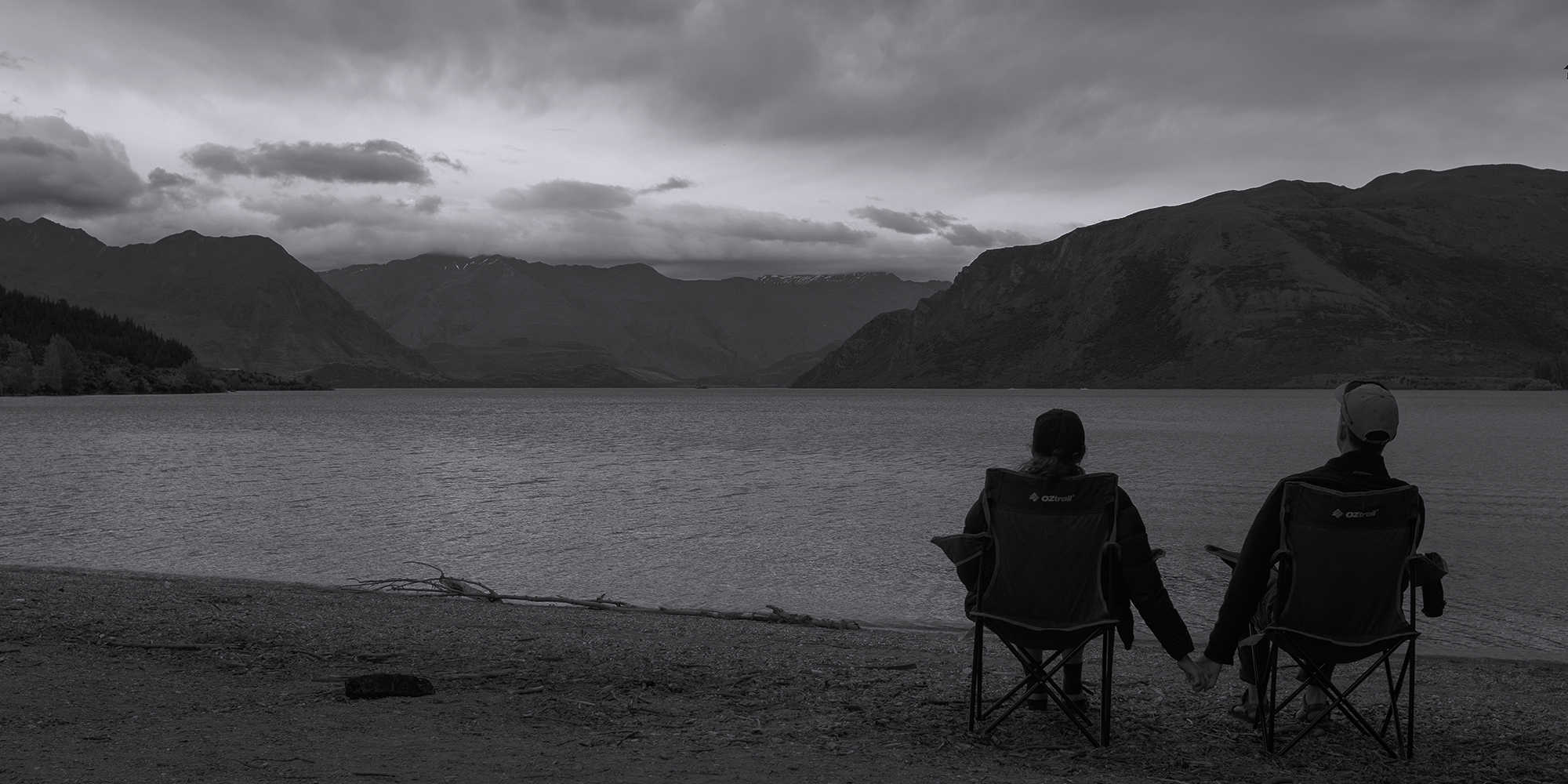 [Describe the photo, e.g. Katie and Aiden on the beach]